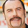John Travolta ejti a zsarol�si v�dakat